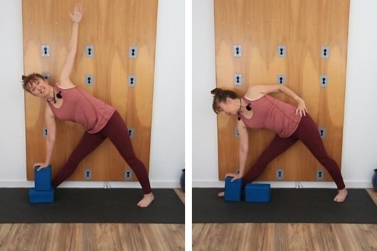 yoga teacher demonstrating triangle pose using blocks